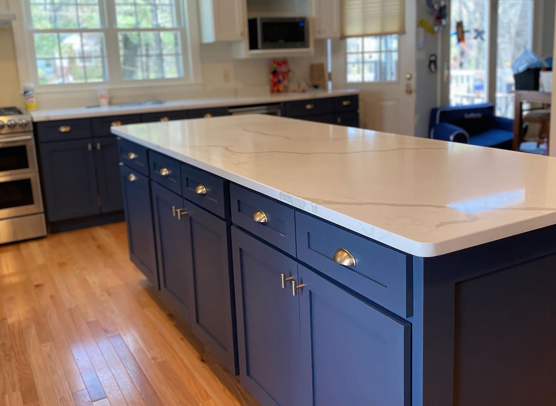 Renovated kitchen with navy island